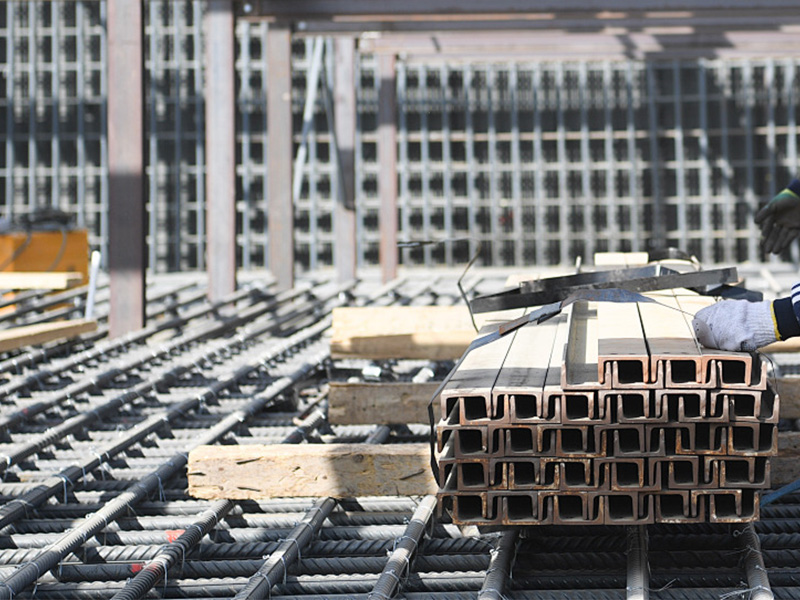 Steel reinforcement mesh and beams on a construction site, the reinforcement and slab build-up that determine what load a warehouse floor can carry