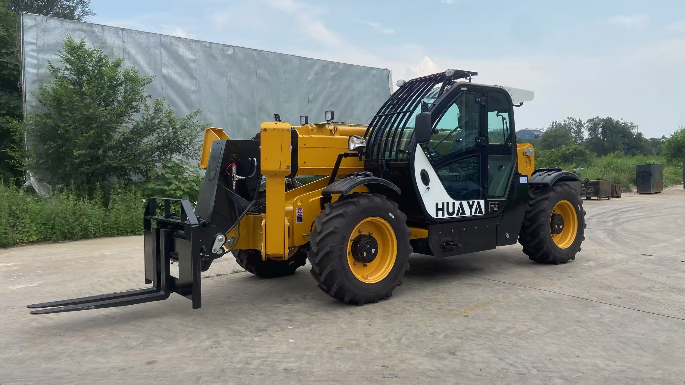 HUAYA telehandler photographed on a concrete yard, an industrial site of the kind that must be classified into hazardous zones before any truck is specified